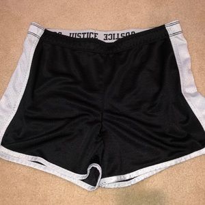 fold over black justice shorts